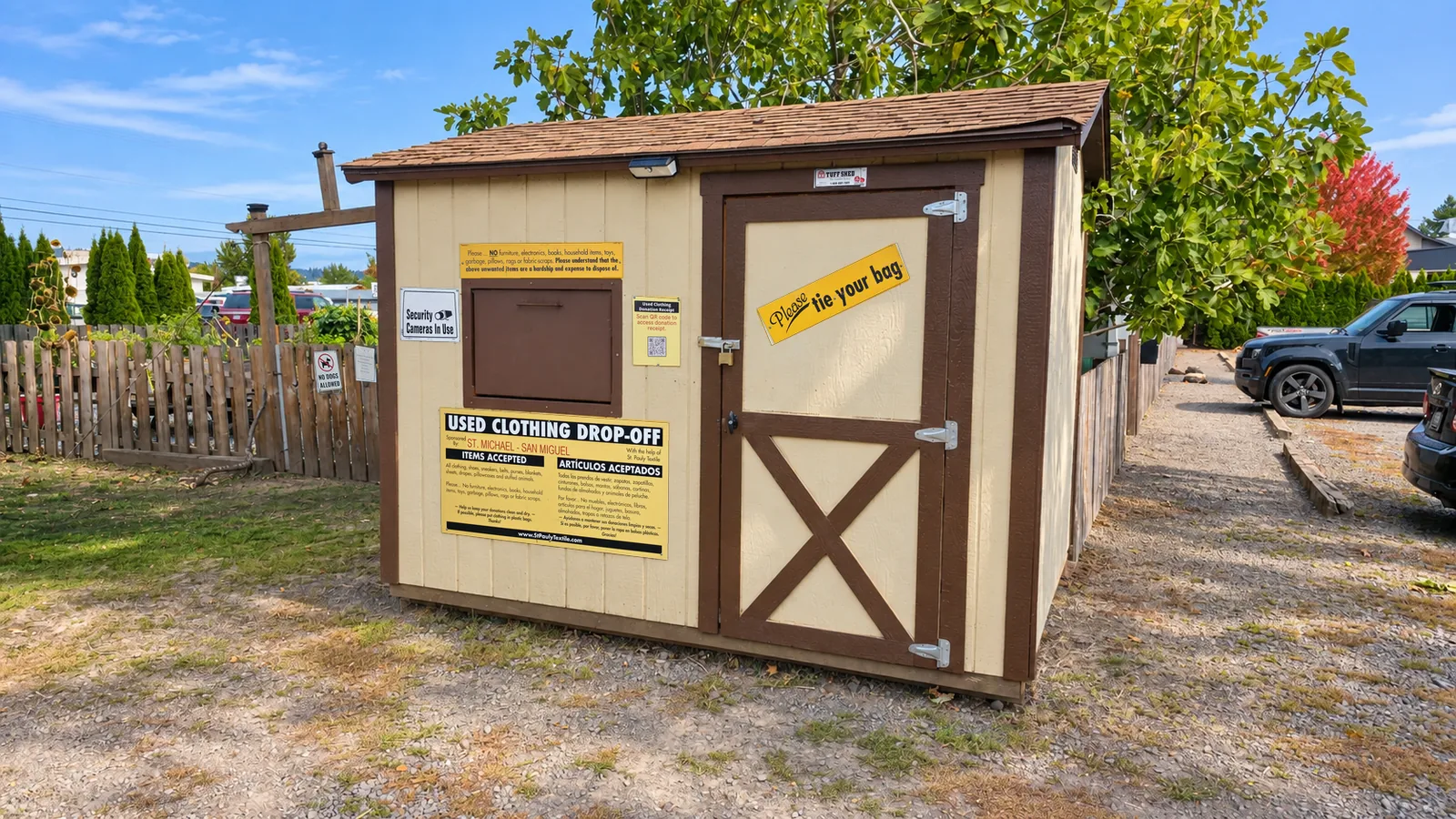 The clothing donation shed in the parking area.