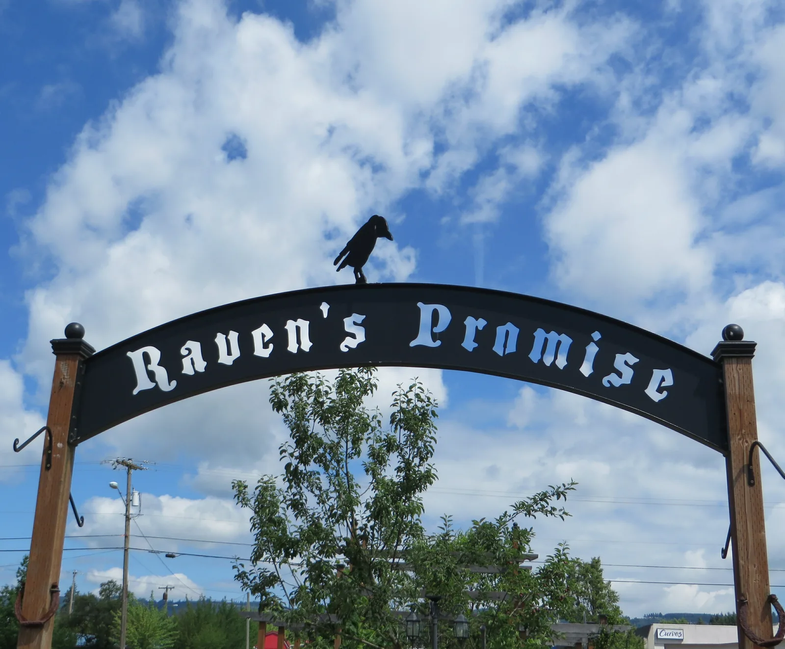 The garden entrance arch bearing the words Raven’s Promise, from the parish archive.