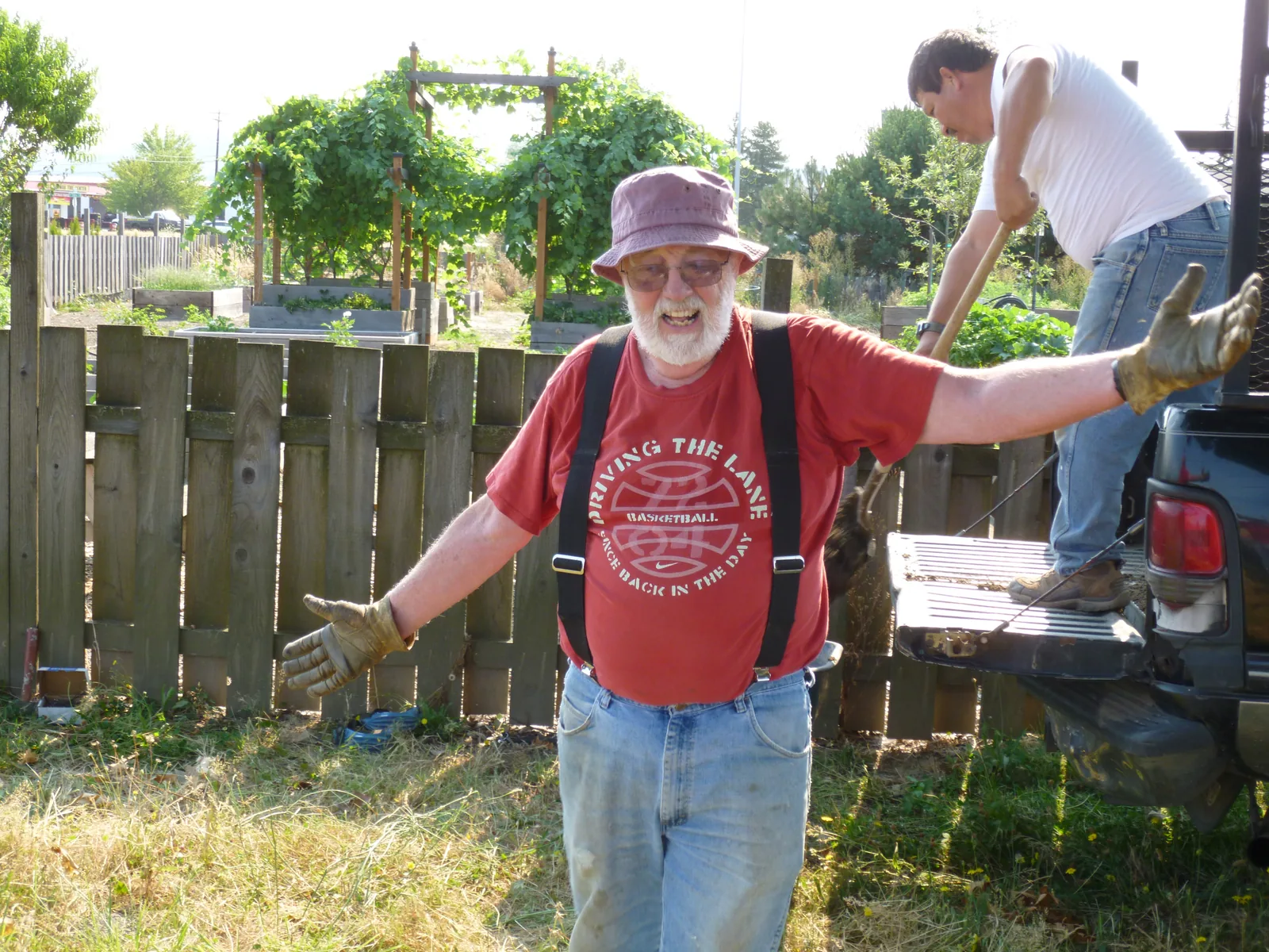 Two people working in the garden in a photograph from the parish archive.