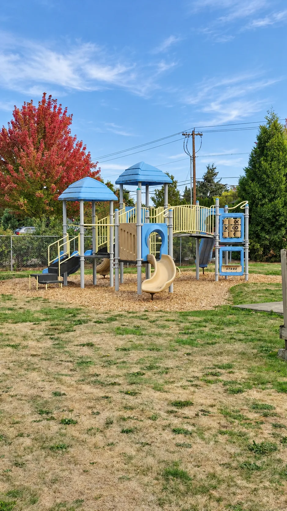 The outdoor play structure beside the church.